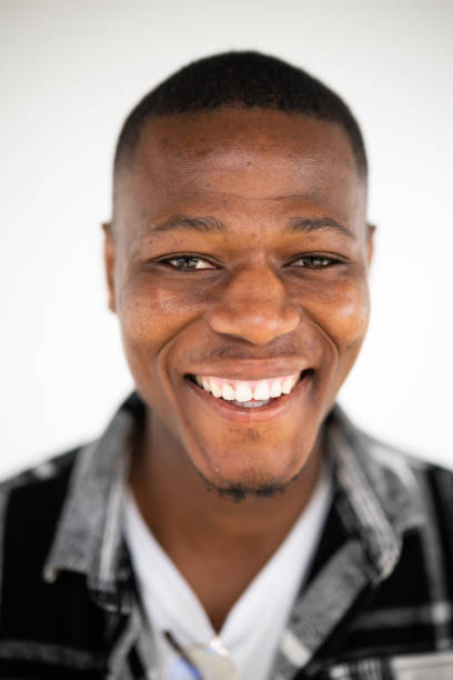 istock Close up portrait laughing young African man looking at the camera 1620799310