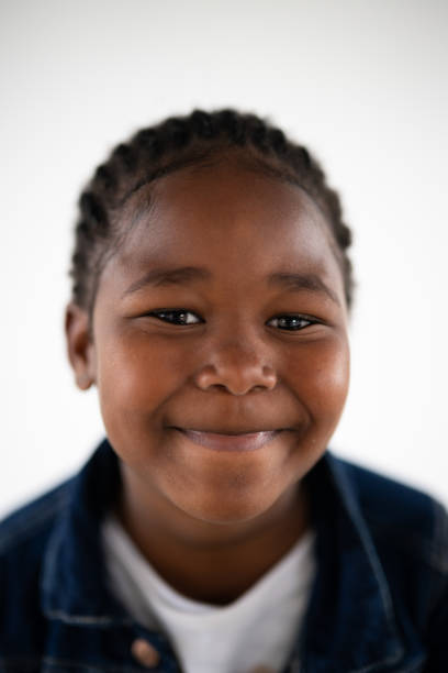 istock Close up cute little black girl with cornrow braids 1620799896