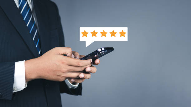 istock Customer or User give rating to service experiences review satisfaction feedback survey on online application, Customer can evaluate quality of service leading to reputation ranking of business. 1620802729