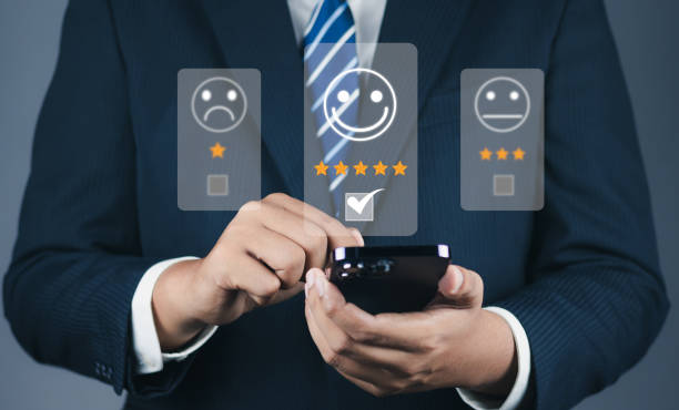 istock Customer or User give rating to service experiences review satisfaction feedback survey on online application, Customer can evaluate quality of service leading to reputation ranking of business. 1620802738