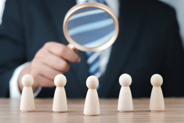 istock Human resource, Talent management, Recruitment employee, Leader concept. Businessman Using a Magnifying Glass to Select Talent for Successful Team Recruitment and Human Resource Management. 1620805520