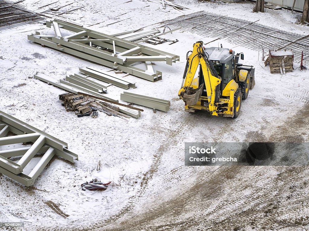 tractor amarillo - Foto de stock de Solar de construcción libre de derechos