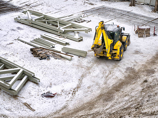 Yellow tractor at construction site