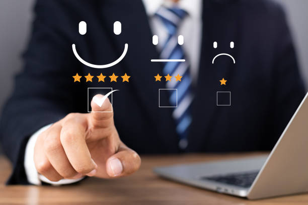 istock Customer or User give rating to service experiences review satisfaction feedback survey on online application, Customer can evaluate quality of service leading to reputation ranking of business. 1620827320