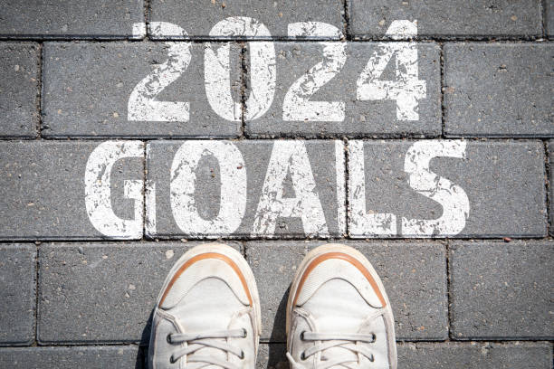 istock 2024 Goals. Text on a paved road background 1620834573