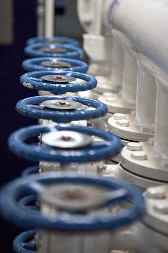 Butterfly Valve manifold assembly with blue color handles.
