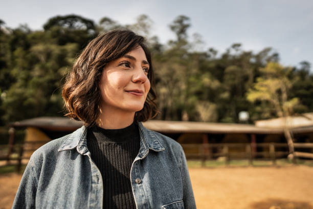 istock Young woman contemplating on a ranch 1620874493