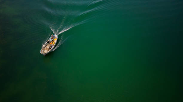 istock Fishing Boat On The Lake 1620878115