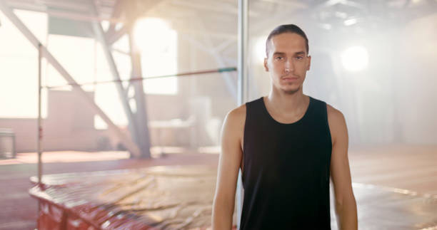 istock Close-up of athlete man standing 1620887325