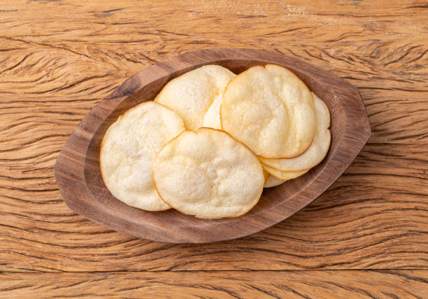 istock Smoked provolone cheese chips in a bowl over wooden table 1620889493