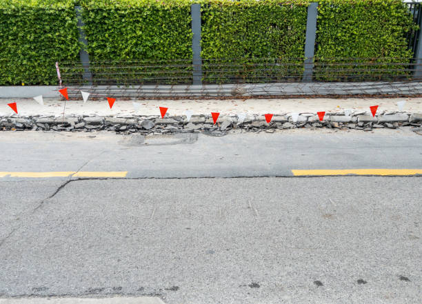 istock The footpath way is broken from the drilling machine. 1620898451
