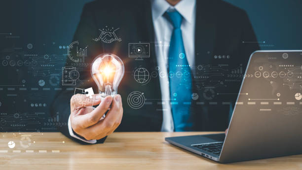 istock Businessman,holding ,light bulb, global internet online 1620923333