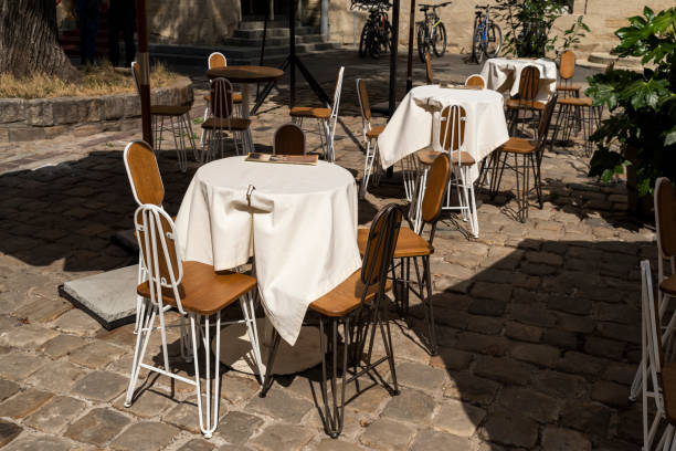 istock tables with a tablecloth and chairs on a summer terrace in a cafe 1620924441