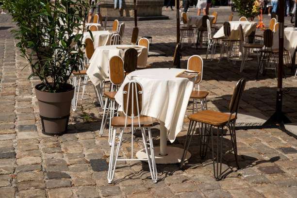 istock tables with a tablecloth and chairs on a summer terrace in a cafe 1620924504