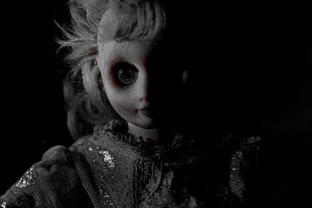 istock Vintage evil spooky doll in the darkness. 1620926828