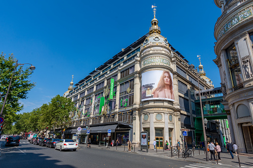Paris, France - August 17, 2023: Burberry Goddess advertising billboard on the facade of the Printemps Haussmann, famous department store of Paris, France