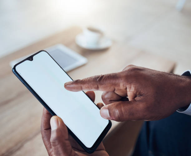 istock Man, hands and mockup smartphone screen for marketing space, online app or digital website. Closeup, mock up mobile and cellphone technology for search, social media and advertising placeholder 1620956581