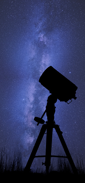 Telescope silhouetted in front of the Milkyway.