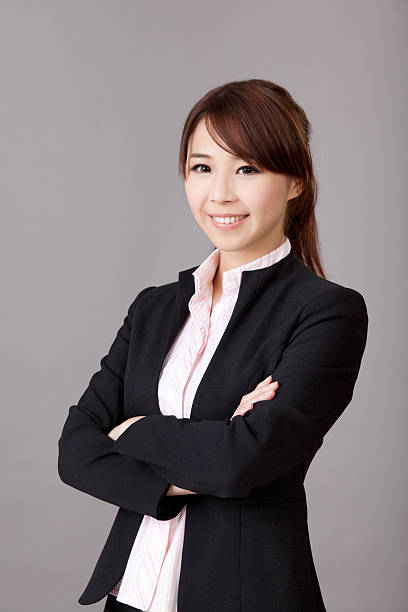 istock Smiling Asian business woman 162100515
