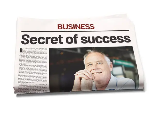 Photo of Secret of success, says business newspaper headline over picture of satisfied businessman