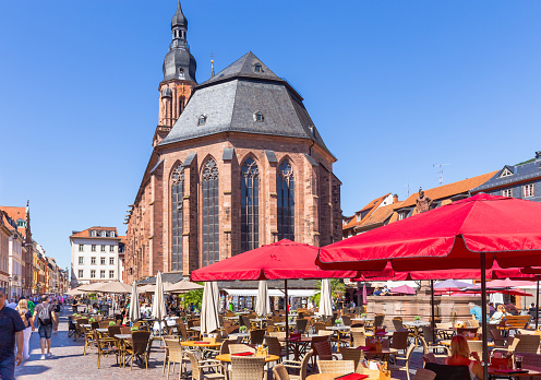 Heidelberg, Germany, August, 10. 2023 - Old Town of Heidelberg with Heiligengeist Church and Pedestrian Zone