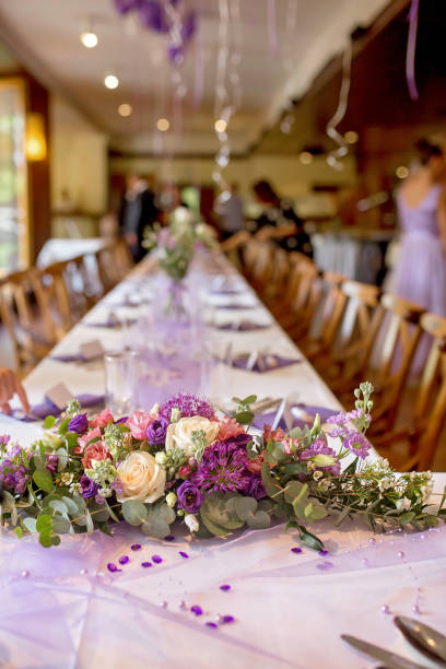 istock Elegant table setup in purple pastels for a restaurant wedding 1621043688