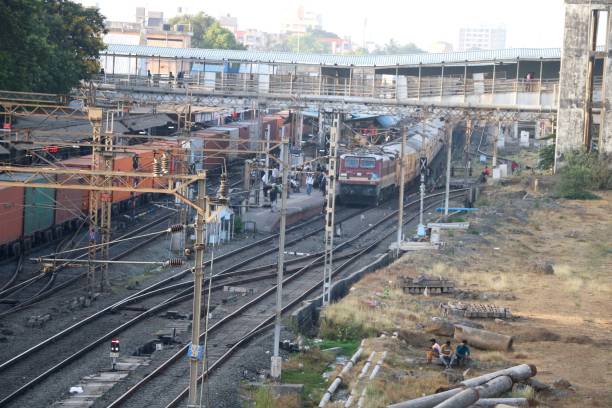 istock Indian goods and passenger train has stopped at rail station 1621092389