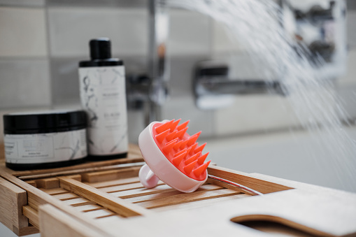 Scalp detox treatment. Head Scalp Exfoliator Massager brush. Silicone brush for circulation and follicle stimulation for optimal scalp health. Silicone Scrubber in the bathroom.