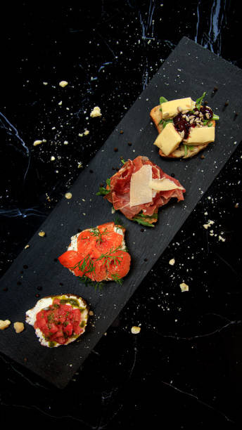istock set of four bruschettas on a black marble table 1621124764