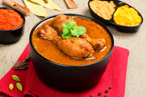 istock Indian style chicken curry in bowl, spicy murgh tari 1621126356
