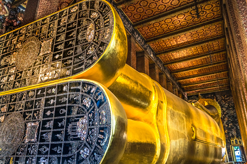 Colorful Reclining Buddha Back Feet Door Wat Phra Chetuphon Wat Pho Po Temple Complex Bangkok Thailand. Temple built in 1600s. Reclining Buddha built in 1832.