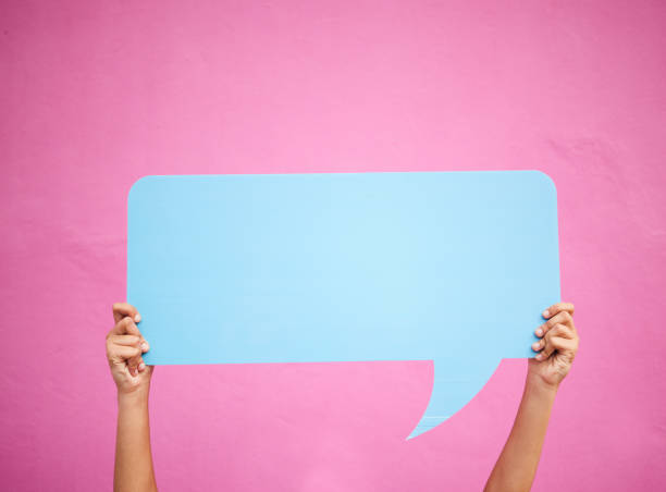 istock Social media, hands and communication speech bubble mockup or opinion, review or feedback space for advertising placement. Quote, dialogue box and person with a sign or billboard, banner or chat 1621185505