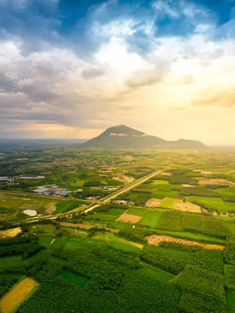 View of the suburbs of Tay Ninh city, Vietnam and in the distance is Ba Den mountain. Travel and landscape concept