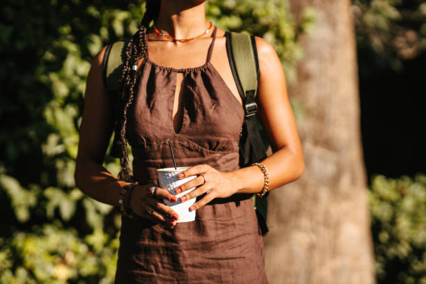 istock Woman holding a coffe cup 1621246407