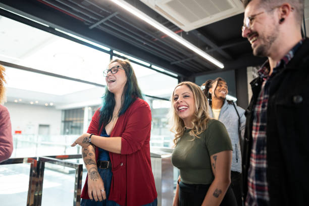 istock Coworkers talking and walking at office 1621253834