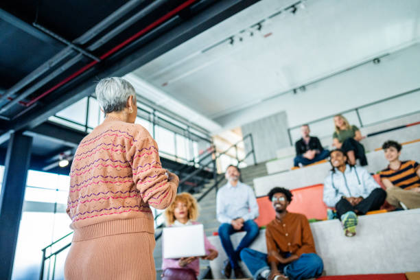 istock Senior businesswoman doing a presentation on a office or modern university 1621254359