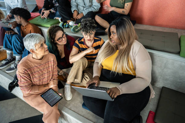 istock Businesswomen talking and using laptop during a meeting at auditorium 1621256070