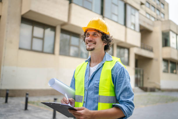 istock architect man construction engineer worker or inspector stand outdoors 1621271476