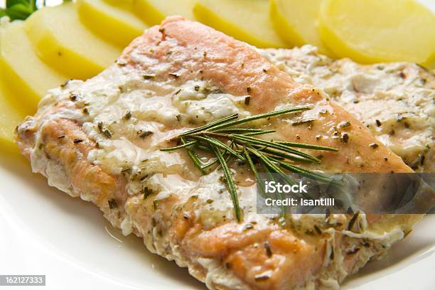 Salmon Fillet With Potatoes Stock Photo - Download Image Now - Cooked, Cooking Oil, Crockery