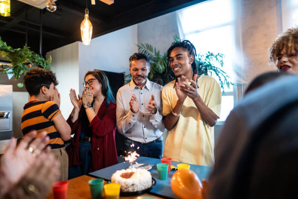 istock Coworkers celebrating birthday office party 1621286064