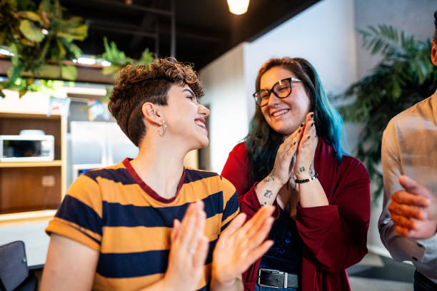 istock Coworkers celebrating birthday office party 1621286594