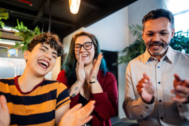 istock Coworkers celebrating birthday office party 1621286595