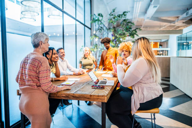 istock CEO/Director woman talking with employees at office 1621318367