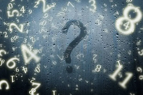numerology, a question mark on a misted window, surrounded by numbers