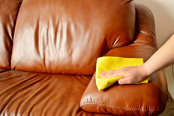 sofa cleaning brown sofa cleaning leather stock pictures, royalty-free photos & images