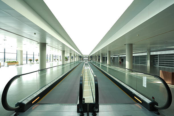istock modern architecture steps of moving business escalator and stairs 162135495