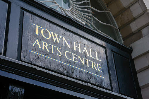 Sign above the door of a Town Hall and Arts Centre.