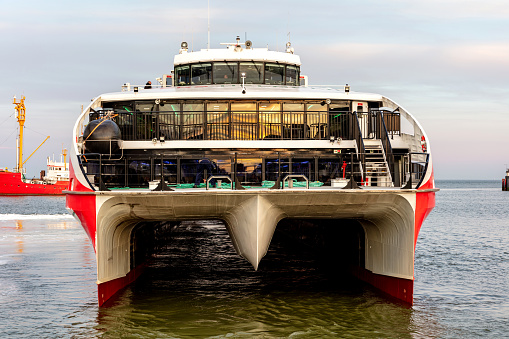 Cuxhaven, Germany - October 29, 2021: passenger catamaran Halunder Jet in the port of Cuxhaven