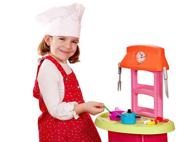 istock beautiful little girl play cooking 162137550