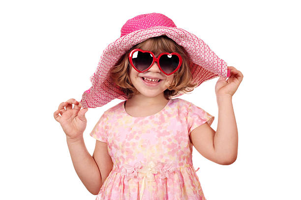 istock happy little girl with big hat 162137595